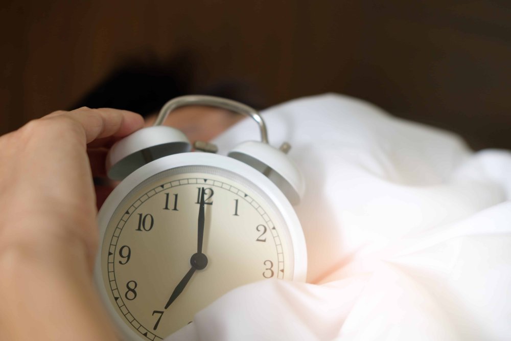 old clock with hands at 7 o'clock