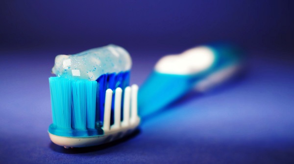 toothbrush with toothpaste applied