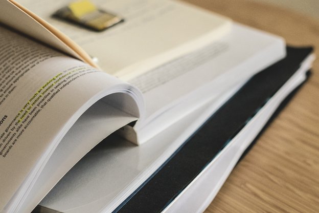 stack of open books